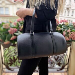 Authentic Louis Vuitton Soufflot shoulder barrel bag in Black Epi Leather M52222